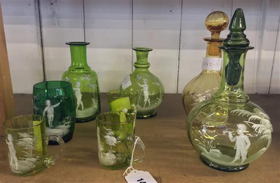 Mary Gregory- green and yellow glass- 2 decanters and stoppers, two carafes and a jug & 4 glasses.